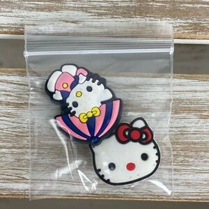 Hello Kitty, two-piece preowned crocs charms for shoes.